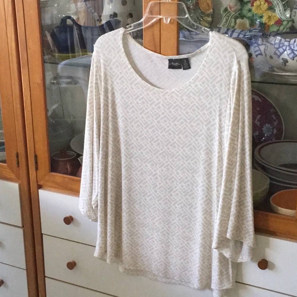 Women’s shirt.  Travelers by Chico’s. Easy care. Loose fit.